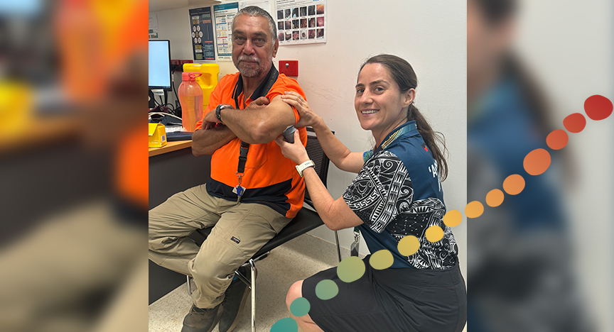 Female nurse with male patient using finger-prick-free glucose sensor.